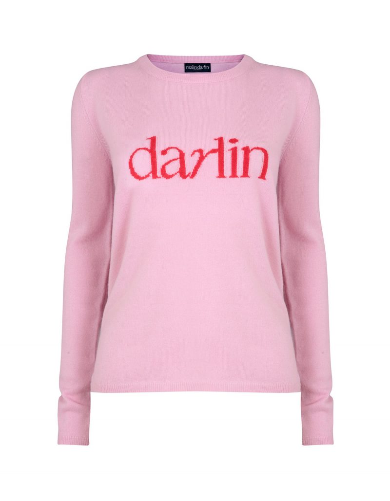 Photo of the malin darlin Darlin Pink designer cashmere jumper isolated on white.