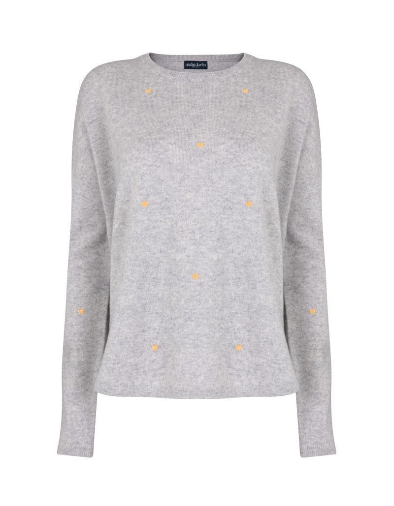 The marl malin darlin Hundred Crowns cashmere jumper pictured against a white backdrop.