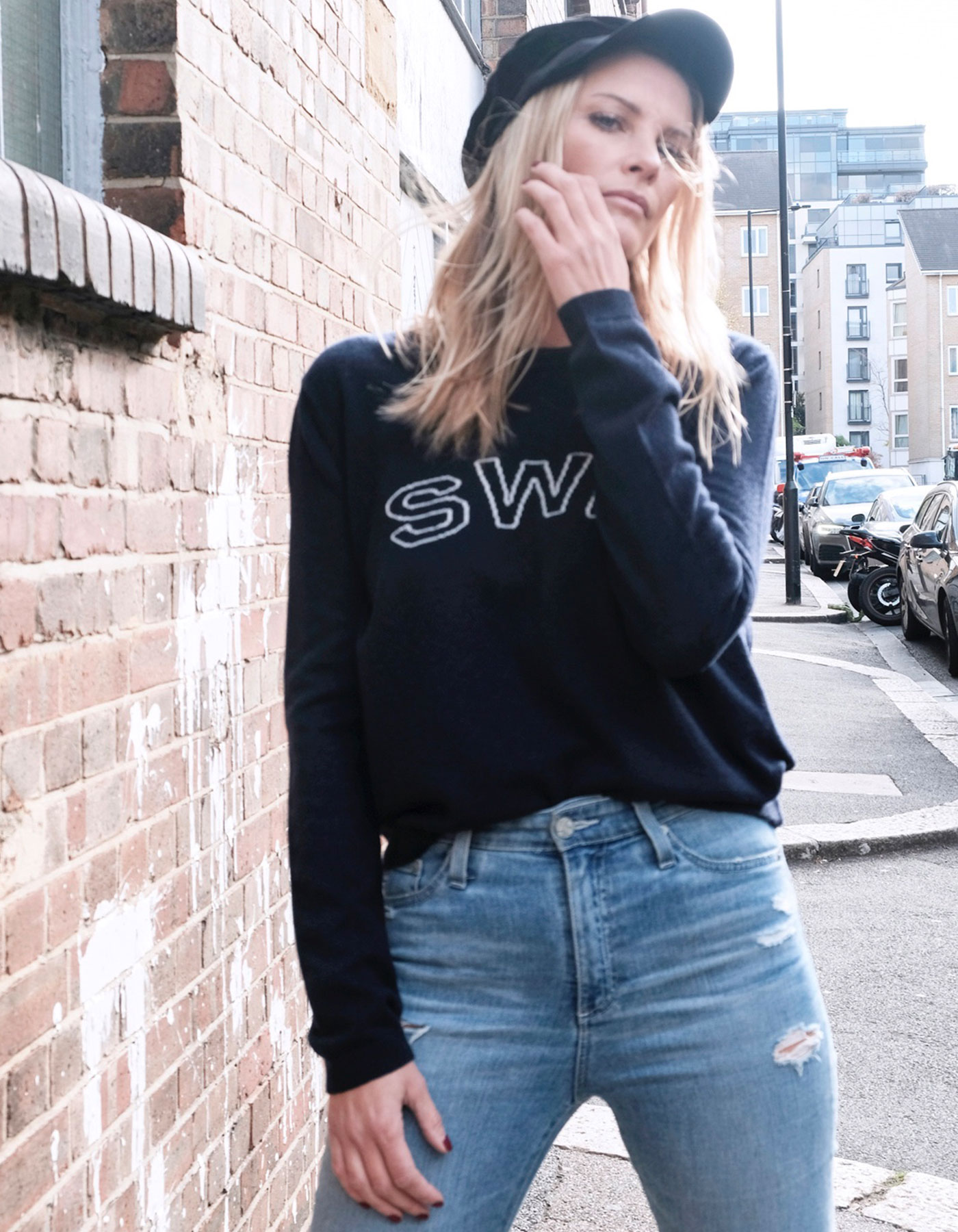 Model wearing a malin darlin SWE designer cashmere jumper.