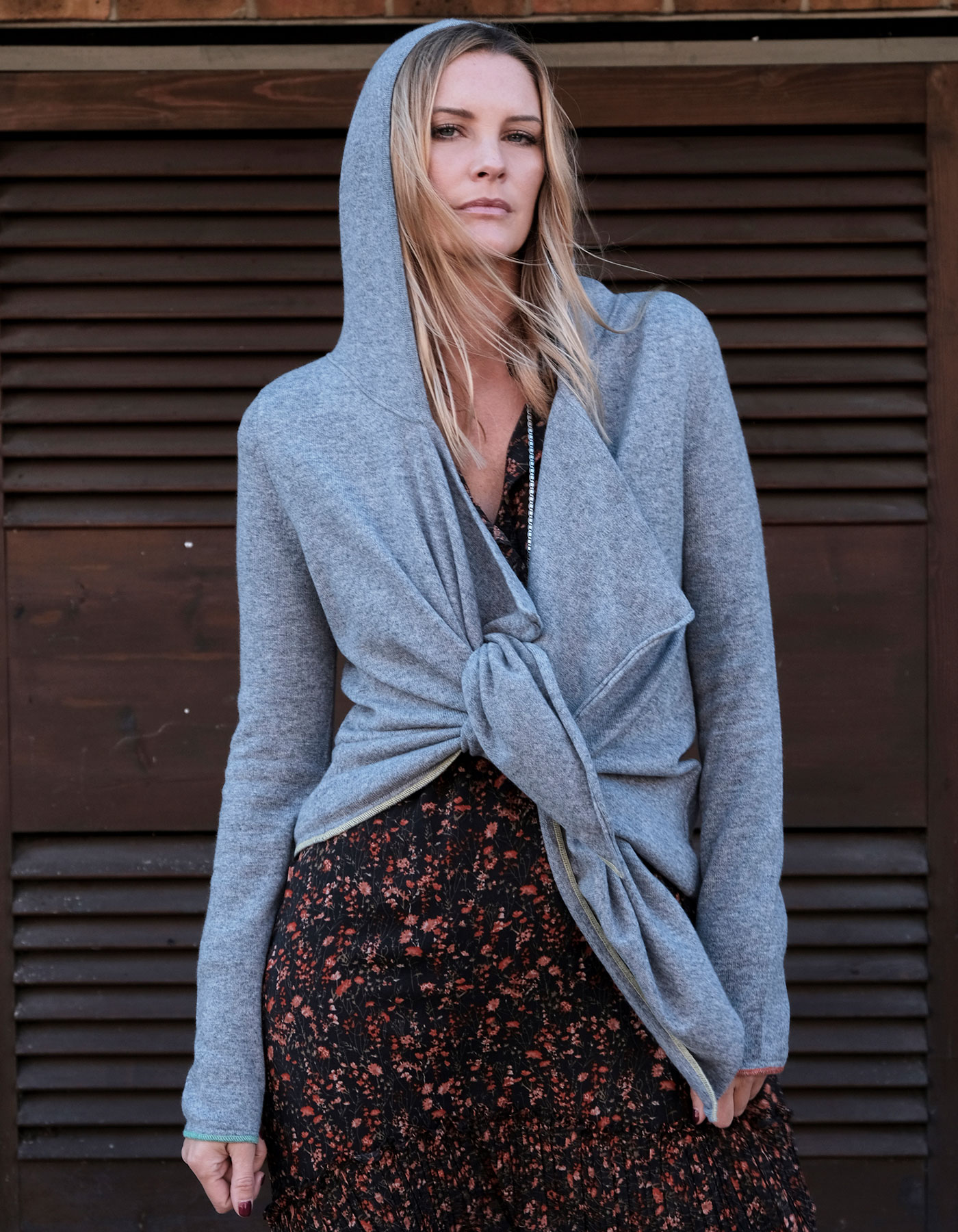 A model in a Tie Hoody Cashmere top by Malin Darlin.