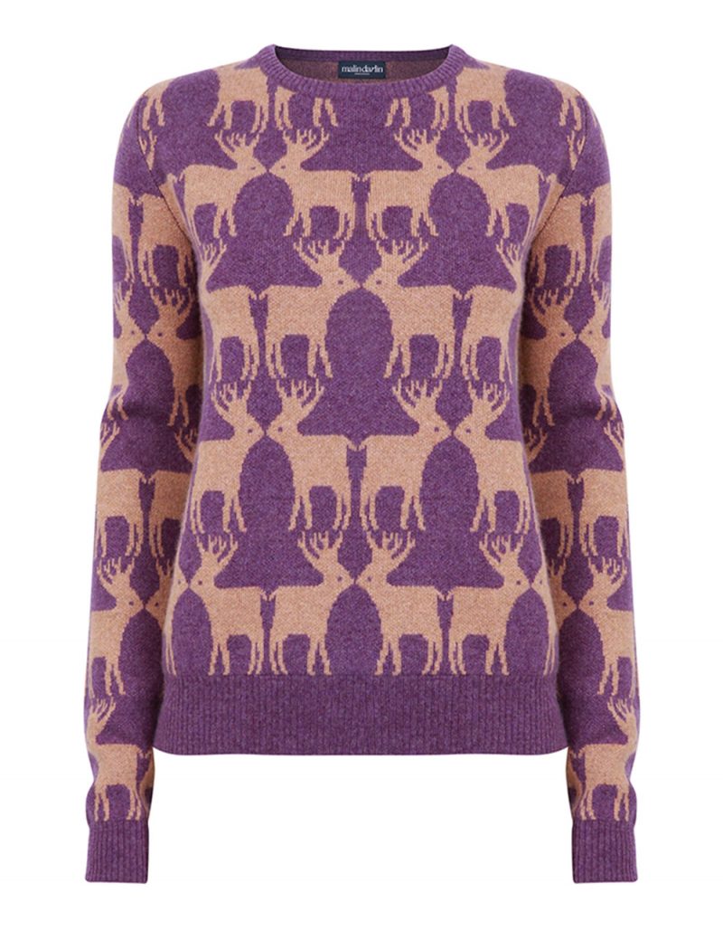 Cashmere knitwear, a malin darlin Reindeer purple cashmere jumper, laid flat on a white background.
