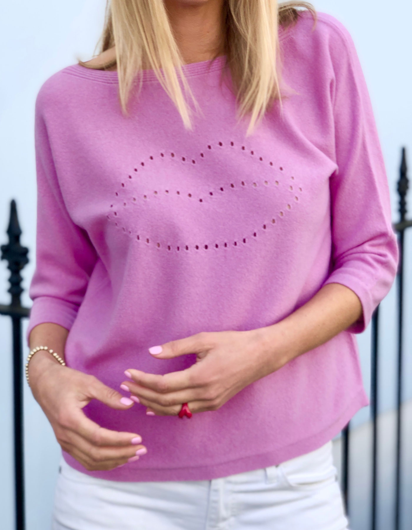 Close up picture of cashmere knitwear, showing the lip detail for malin darlin Lip Holes cashmere jumpers.